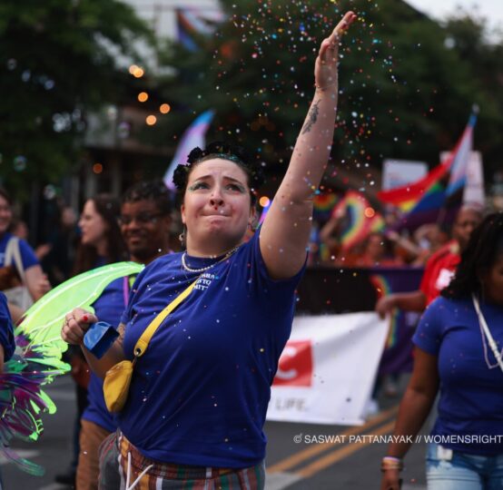 woman DANCING IN A PARADE